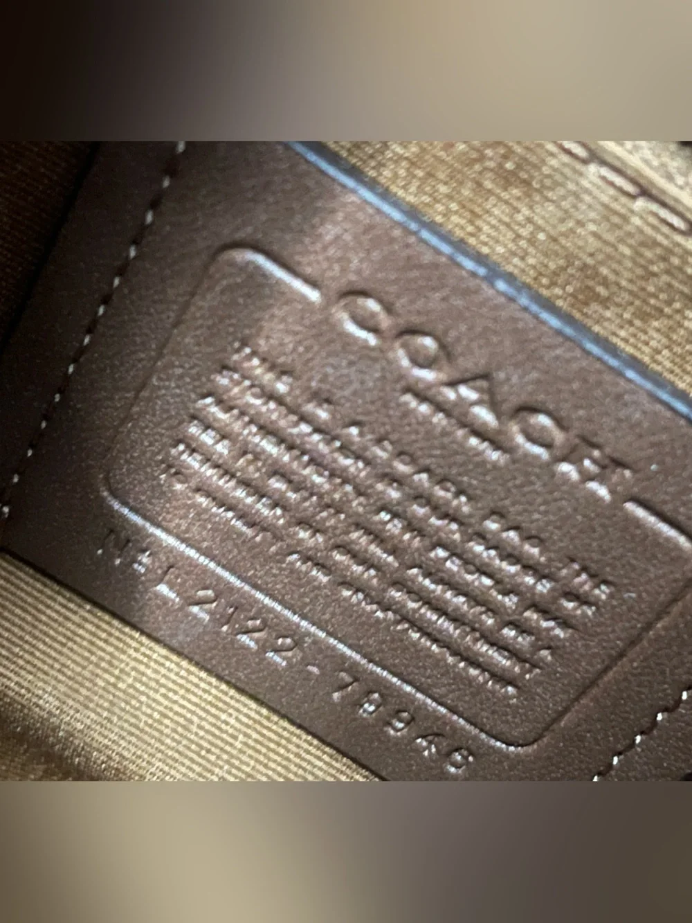 Coach Rowan medium in cream with gold hardware.